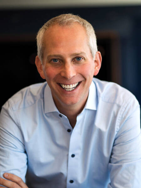 John Garrett | People-centric Leadership Expert - Award-winning author of "What's Your 'And'?"